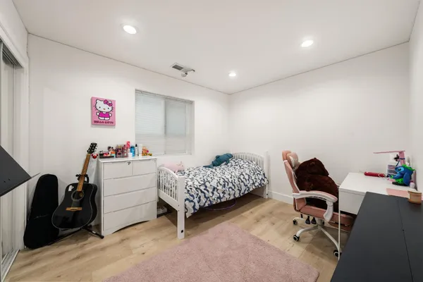 a room with furniture and a chair