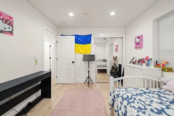 a bedroom with furniture and a bed