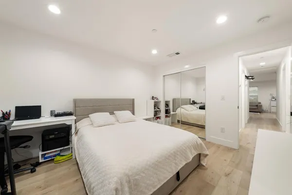 a bed room with a bed and with furniture