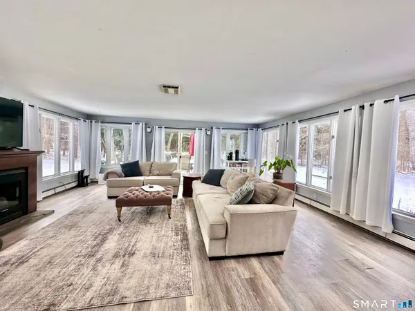 a living room with furniture and a couch