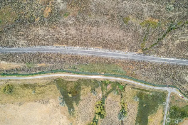 an aerial view of mountain with beach