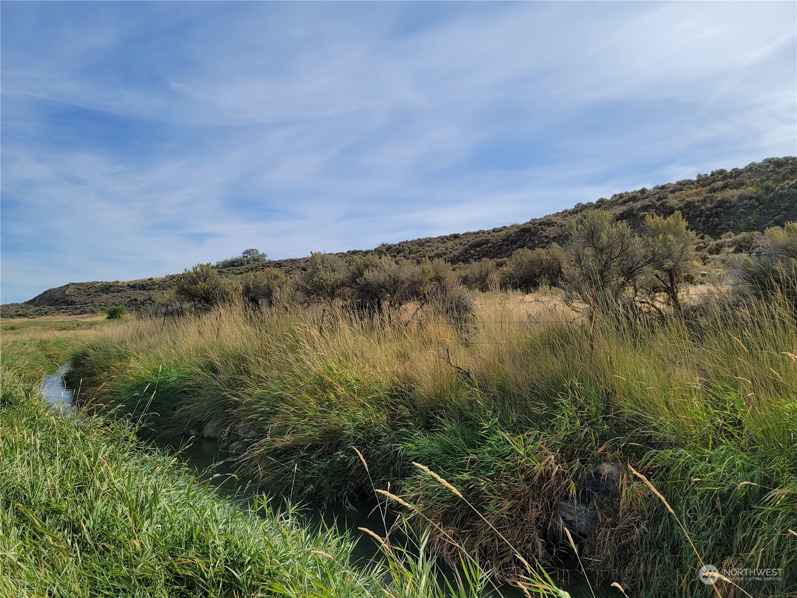 -nna South O'Brian Road Othello, WA 99344 - Photo 24 of 31 a view of a lake and green valley