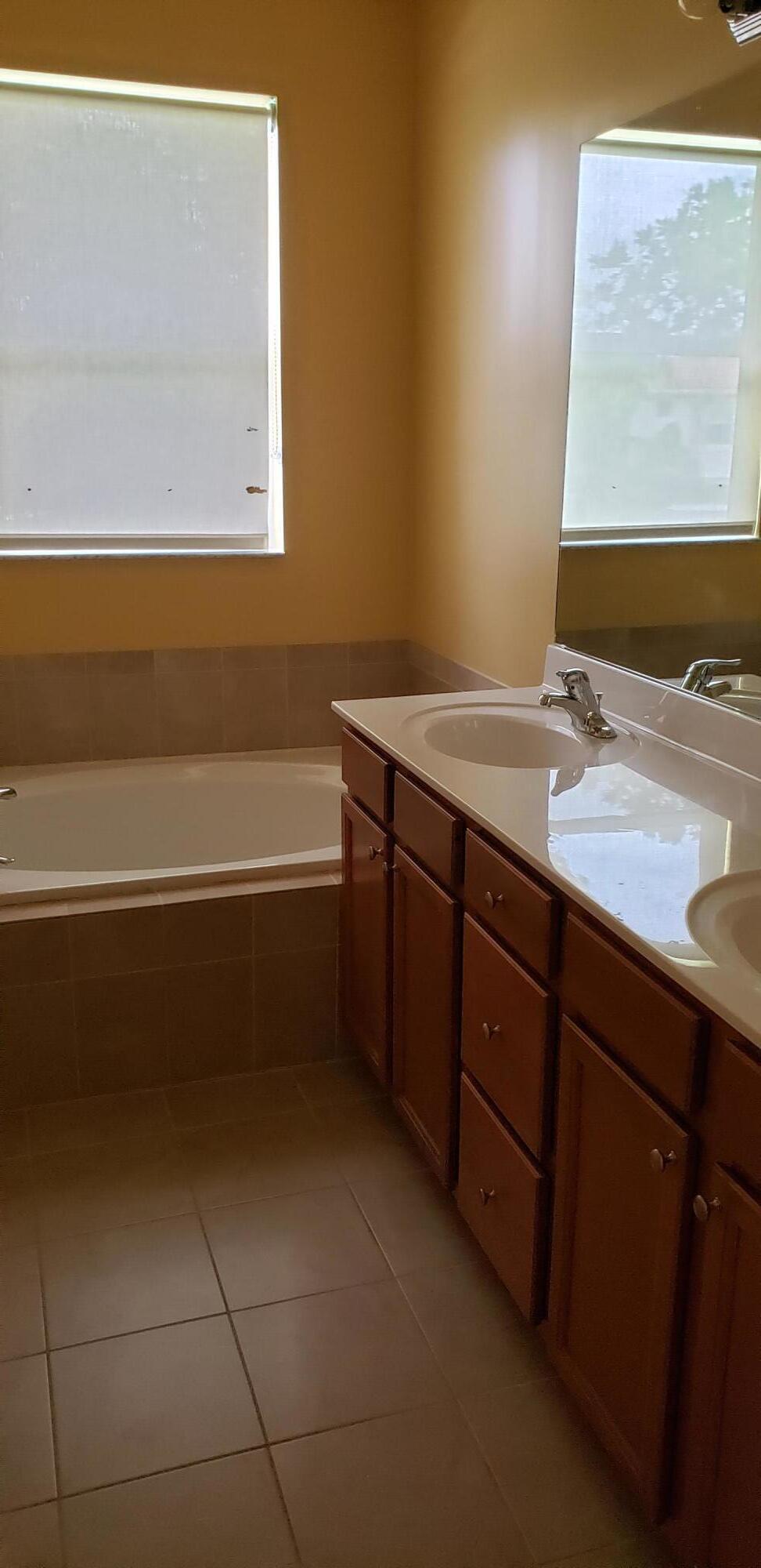 9475 Southwest Merlin Court Stuart, FL 34997 - Photo 8 of 10 20210513_124315