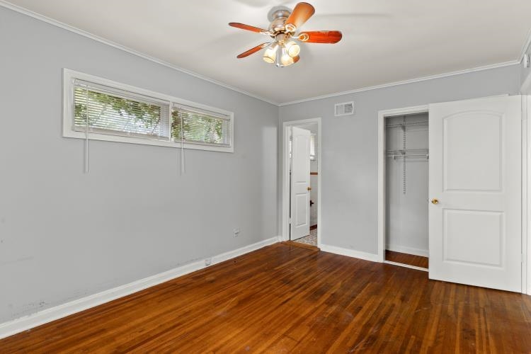 1042 Ivy Road Memphis, TN 38117 - Photo 14 of 27 a view of empty room with wooden floor