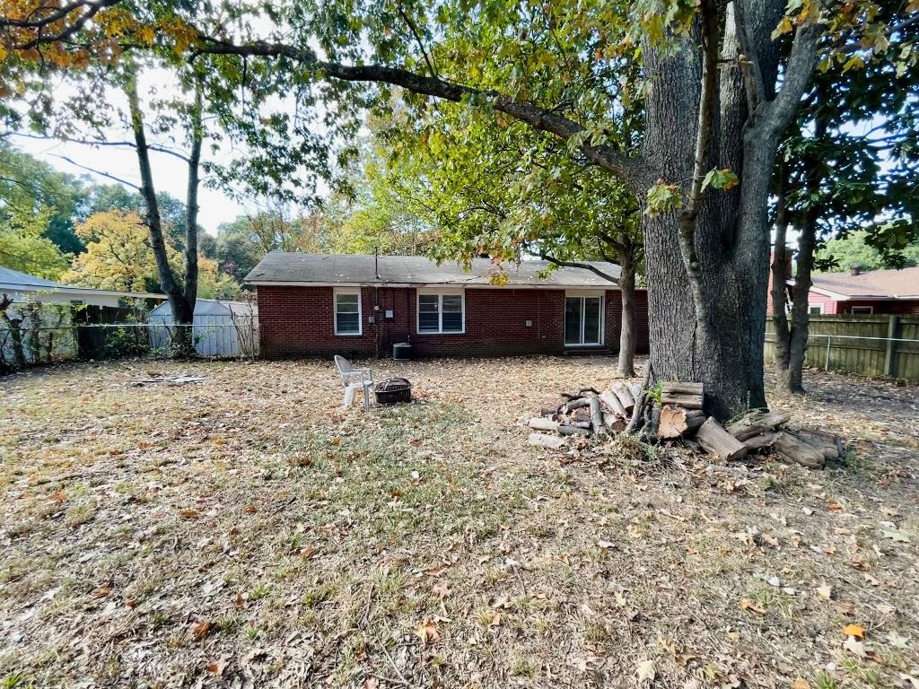 1042 Ivy Road Memphis, TN 38117 - Photo 27 of 27 a view of house with yard and sitting area