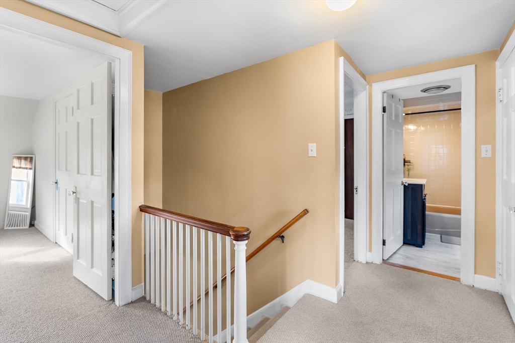 41 Pilgrim Road Weymouth, MA 02191 - Photo 11 of 27 a view of a hallway with closet area