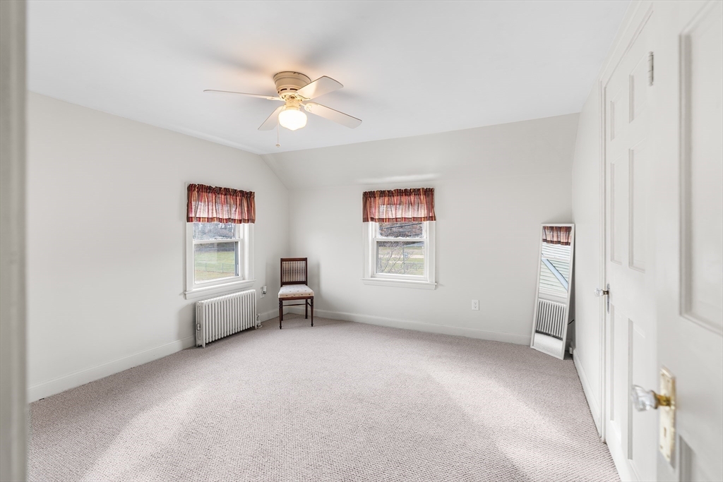 41 Pilgrim Road Weymouth, MA 02191 - Photo 13 of 27 a view of an empty room with a window