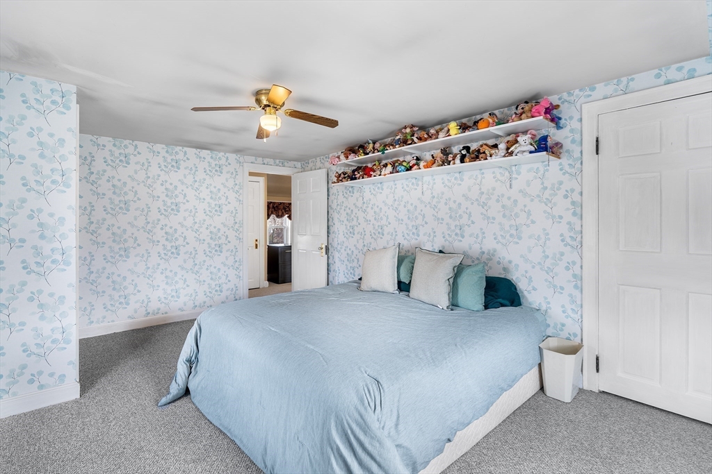 41 Pilgrim Road Weymouth, MA 02191 - Photo 15 of 27 a bedroom with a bed and a window