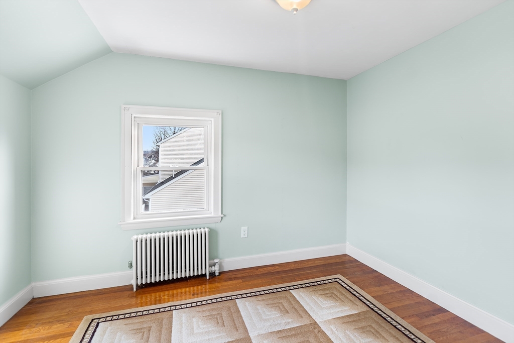 41 Pilgrim Road Weymouth, MA 02191 - Photo 19 of 27 a view of empty room with wooden floor