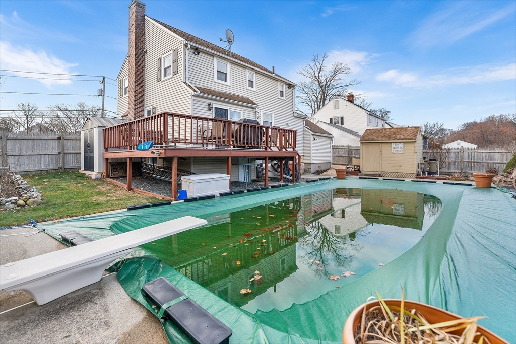 41 Pilgrim Road Weymouth, MA 02191 - Photo 25 of 27 a view of a house with pool and chairs