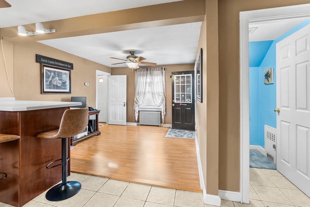 41 Pilgrim Road Weymouth, MA 02191 - Photo 6 of 27 a view of a livingroom with furniture and hardwood floor