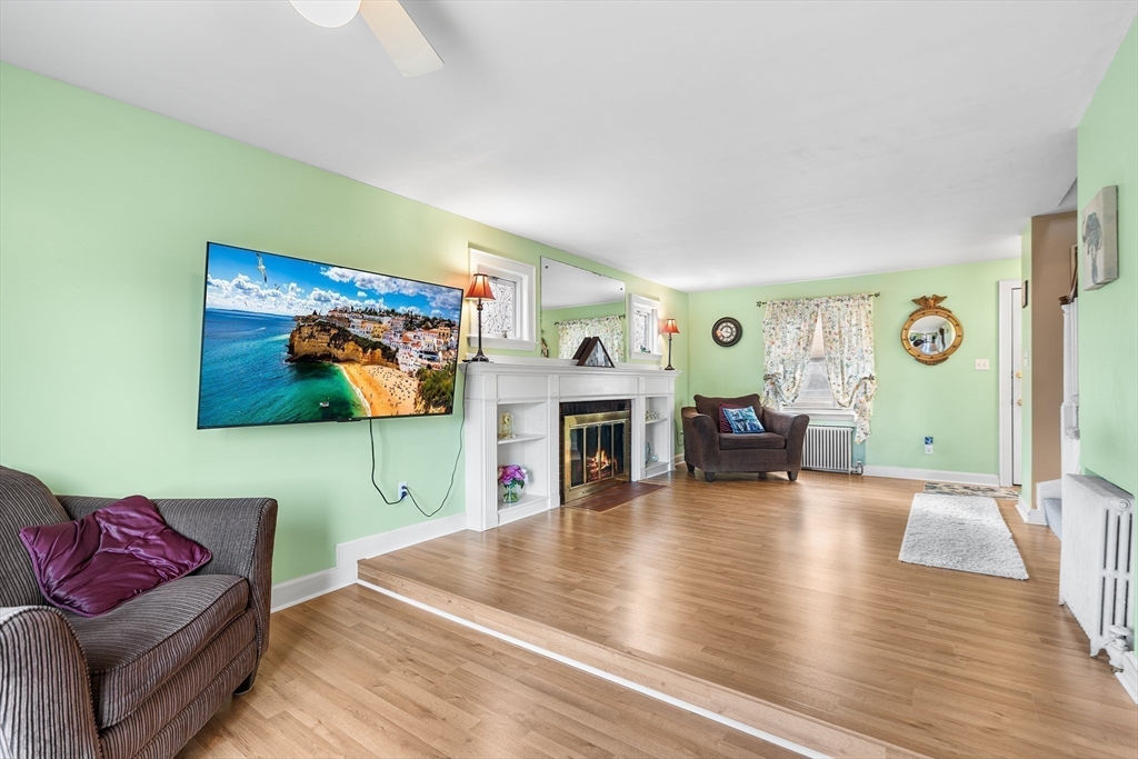 41 Pilgrim Road Weymouth, MA 02191 - Photo 8 of 27 a living room with furniture and wooden floor