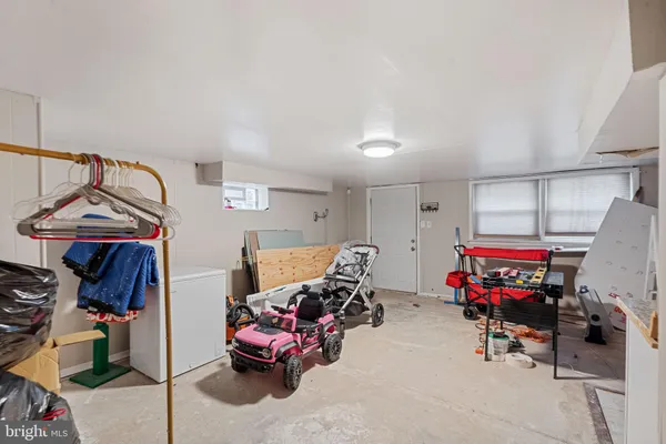 a children room with toys and white walls