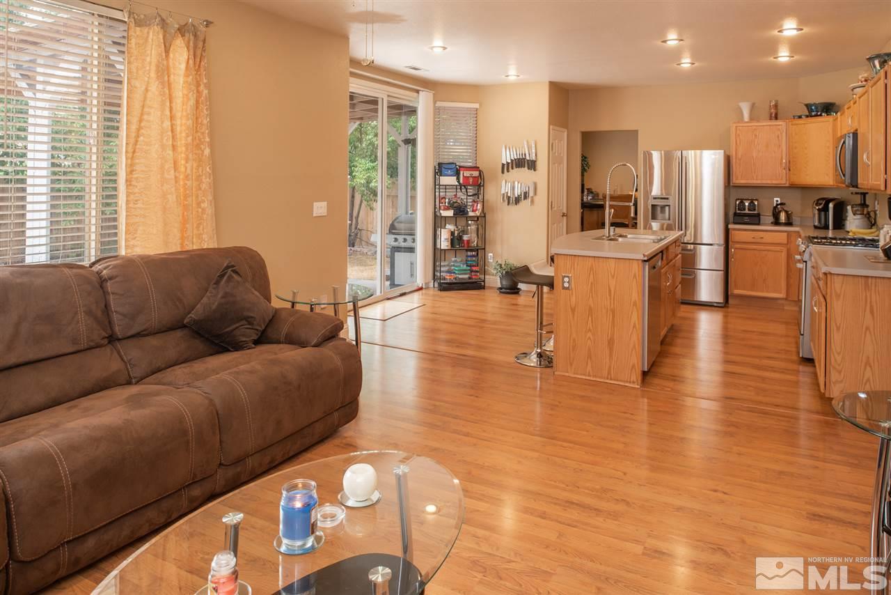 8130 Monterey Reno, NV 89506 - Photo 8 of 22 a living room with furniture and kitchen view