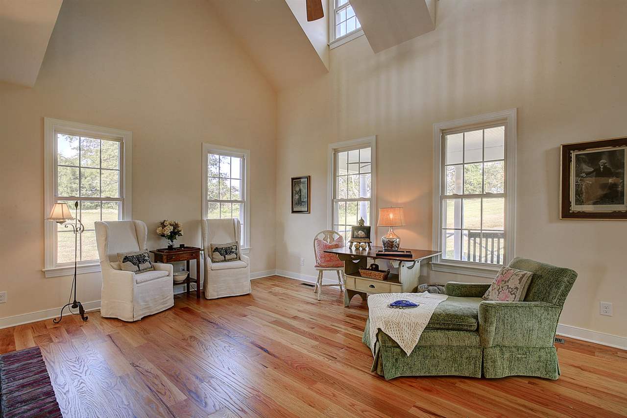3265 Burnt Mill Road Charlottesville, VA 22911 - Photo 18 of 30 a living room with furniture and wooden floor