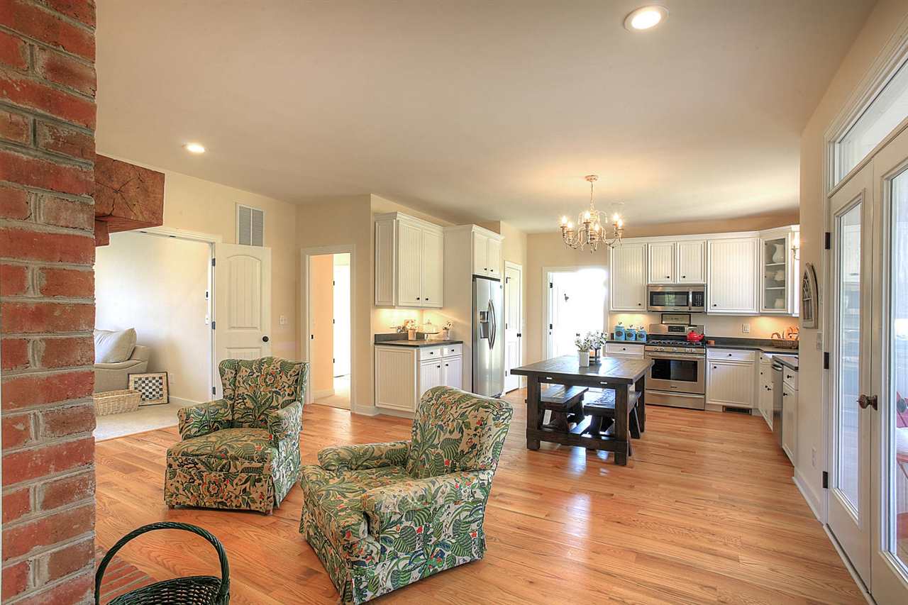 3265 Burnt Mill Road Charlottesville, VA 22911 - Photo 19 of 30 a living room with furniture and kitchen view