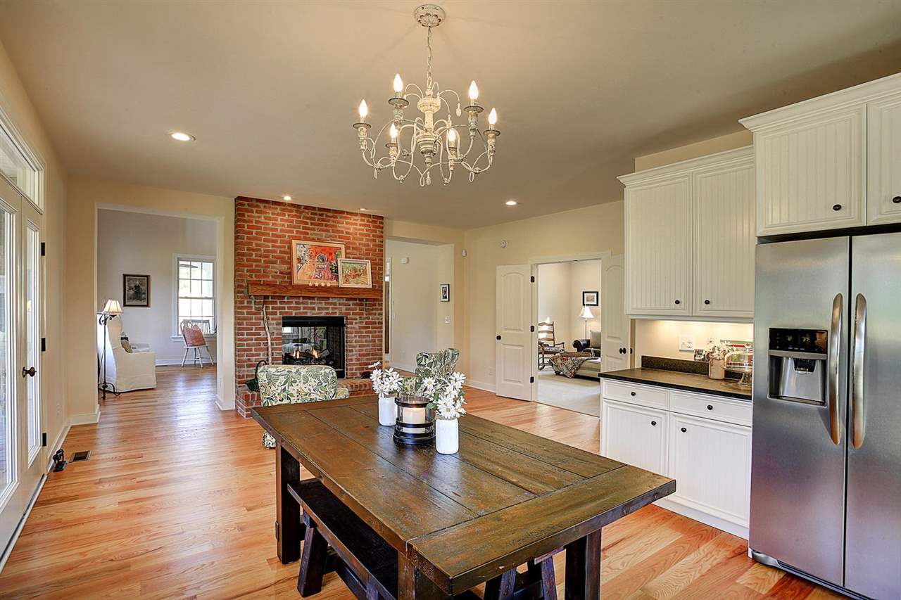 3265 Burnt Mill Road Charlottesville, VA 22911 - Photo 20 of 30 a large kitchen with a table and chairs