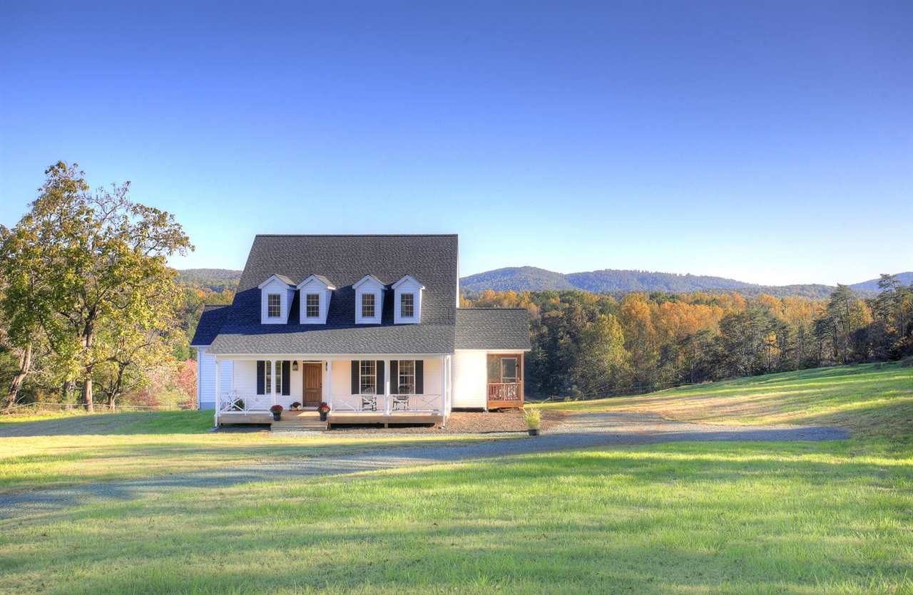 3265 Burnt Mill Road Charlottesville, VA 22911 - Photo 6 of 30 a front view of a house with a swimming pool