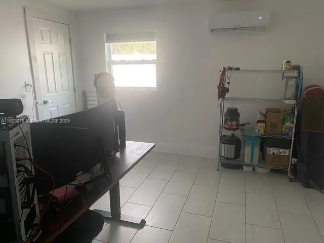 a room with furniture and a gate