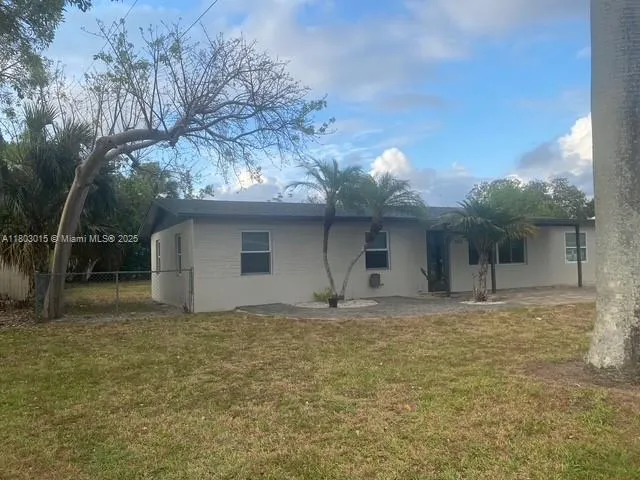 a front view of house with yard