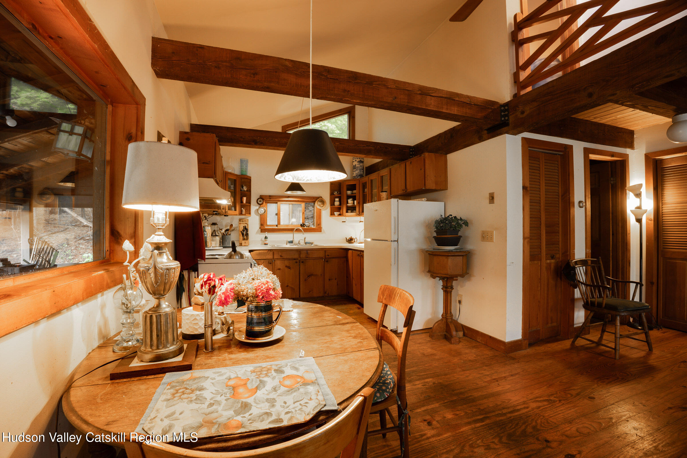 1635 High Falls Road Catskill, NY 12414 - Photo 13 of 43 a view of a dining room with furniture and chandelier