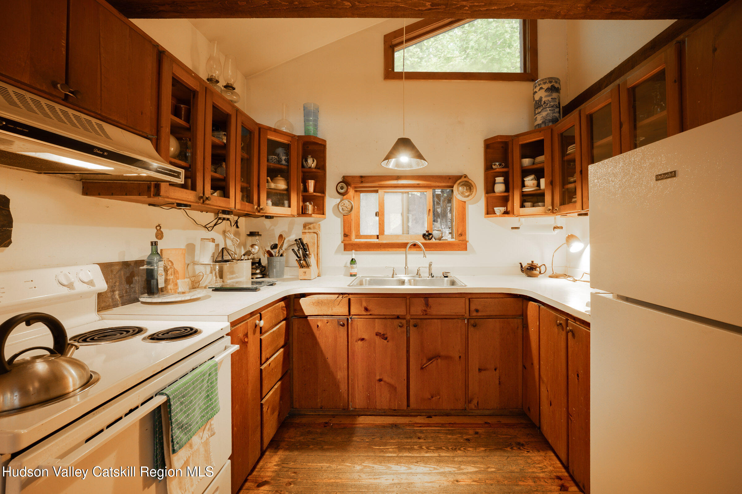 1635 High Falls Road Catskill, NY 12414 - Photo 14 of 43 a kitchen with stainless steel appliances a sink and a refrigerator