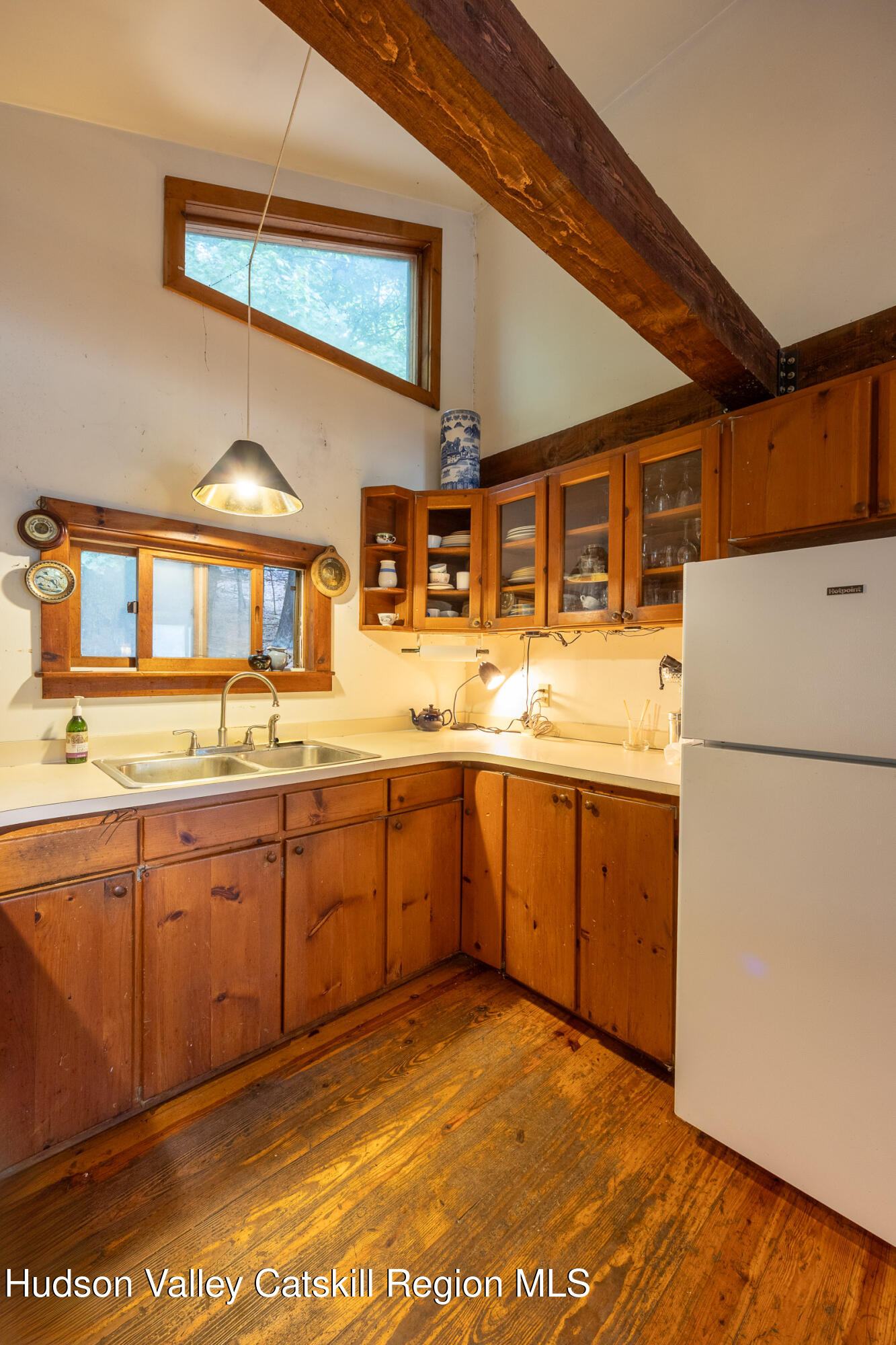 1635 High Falls Road Catskill, NY 12414 - Photo 15 of 43 a kitchen with a sink and cabinets