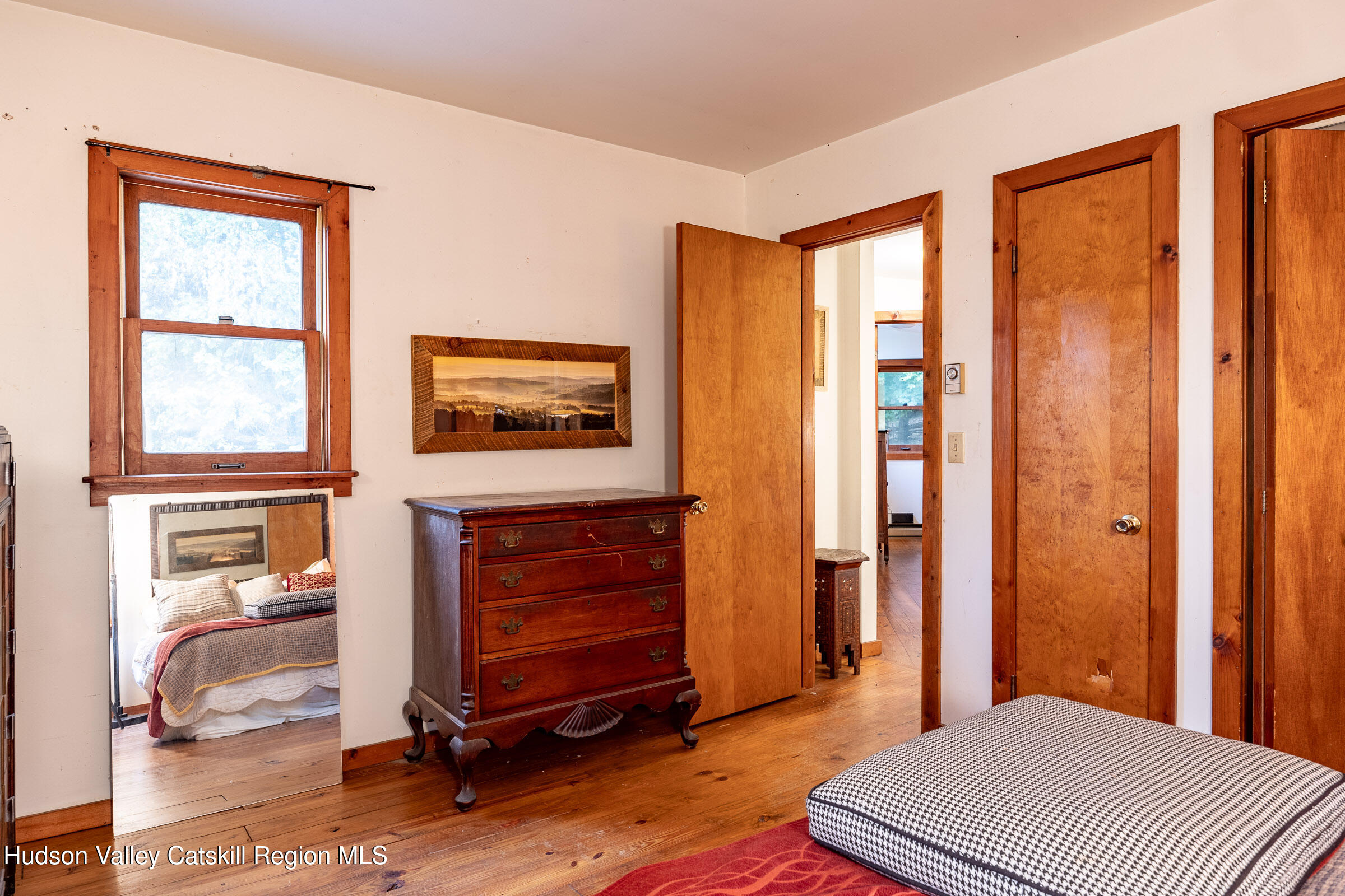 1635 High Falls Road Catskill, NY 12414 - Photo 19 of 43 a bedroom with a bed and a window