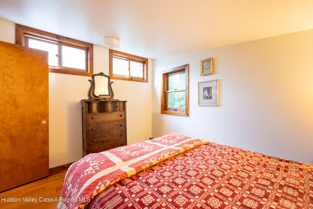 a view of a room with wooden walls