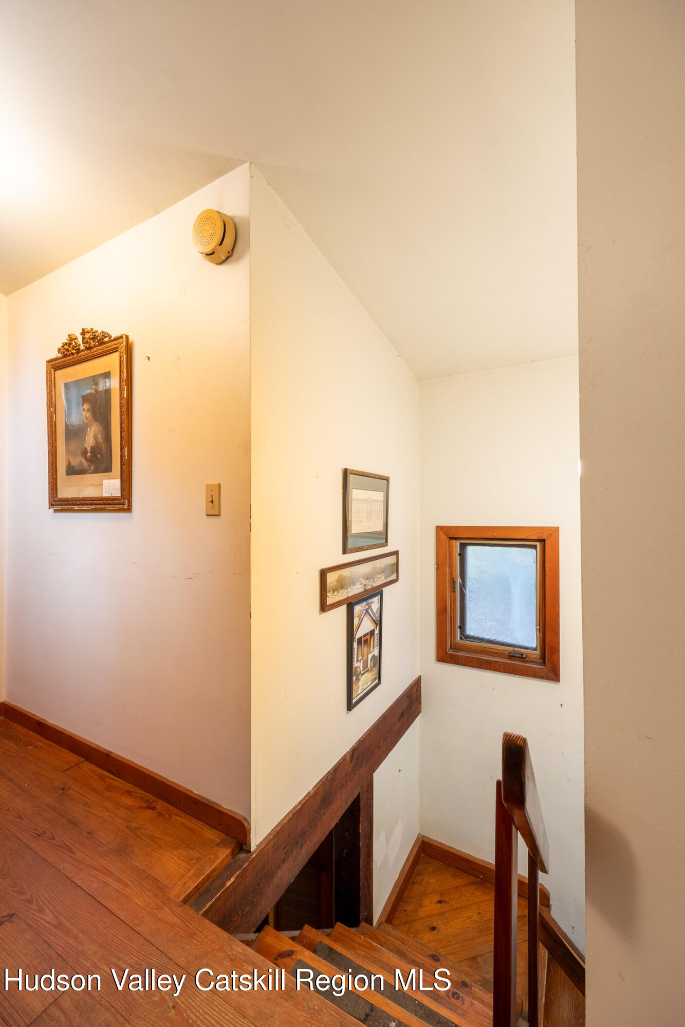 1635 High Falls Road Catskill, NY 12414 - Photo 22 of 43 a view of a hallway with paintings on the wall
