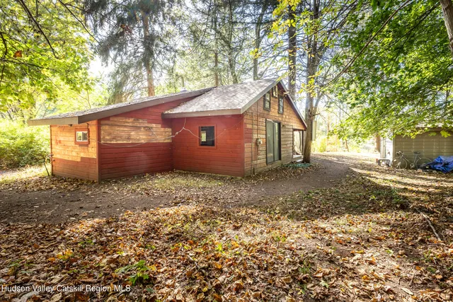 a view of a gym with wooden floor