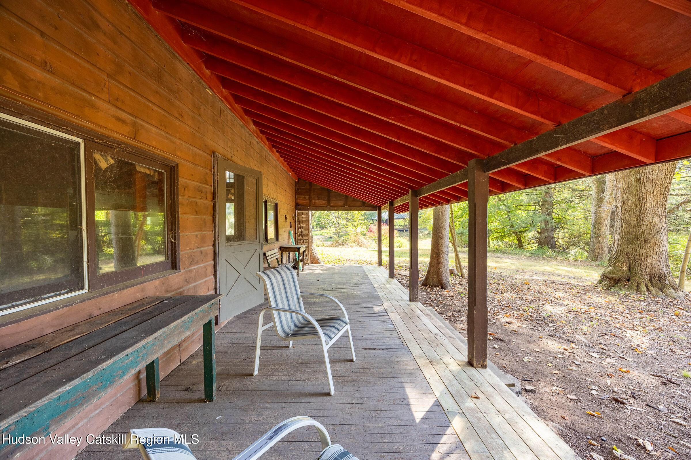 1635 High Falls Road Catskill, NY 12414 - Photo 28 of 43 a view of a patio with a table chairs and a backyard