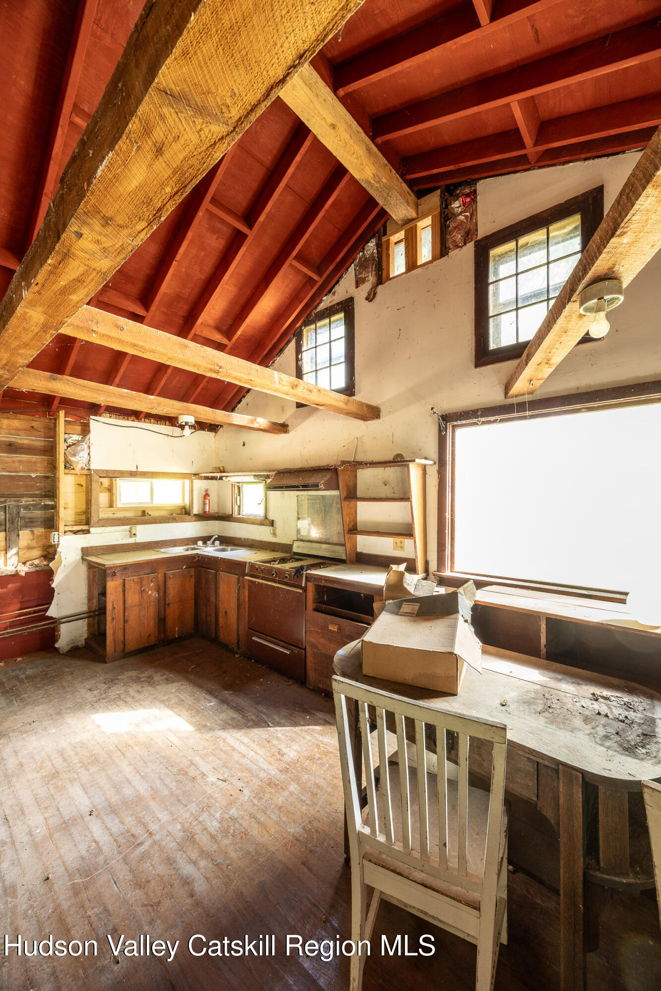 1635 High Falls Road Catskill, NY 12414 - Photo 30 of 43 a kitchen with table and chairs