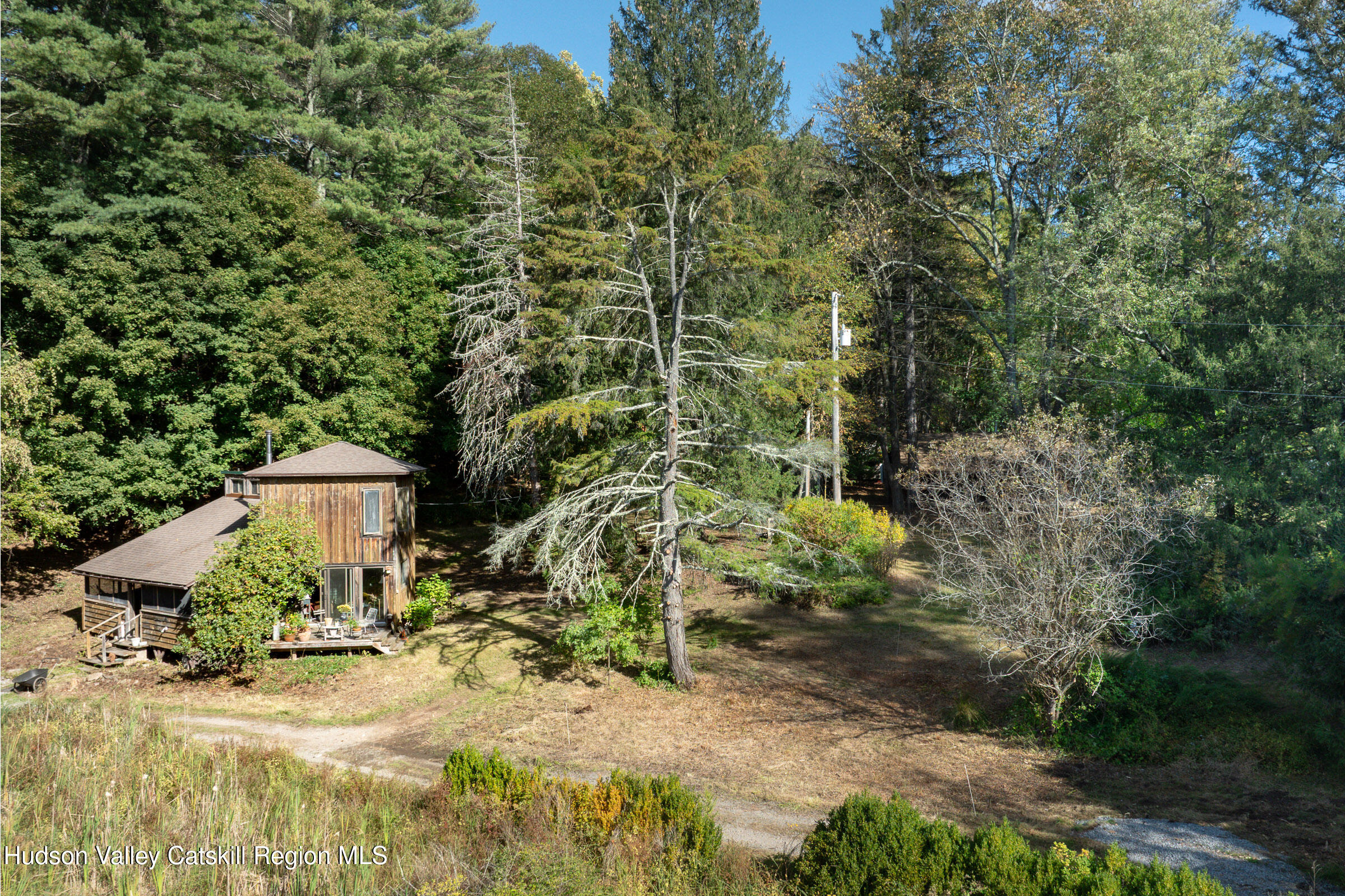 1635 High Falls Road Catskill, NY 12414 - Photo 3 of 43 a view of a house with large trees and plants