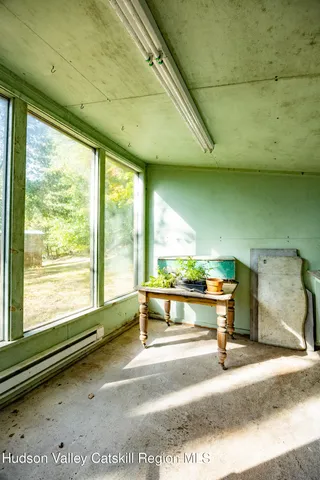 a view of outdoor space with trees all around