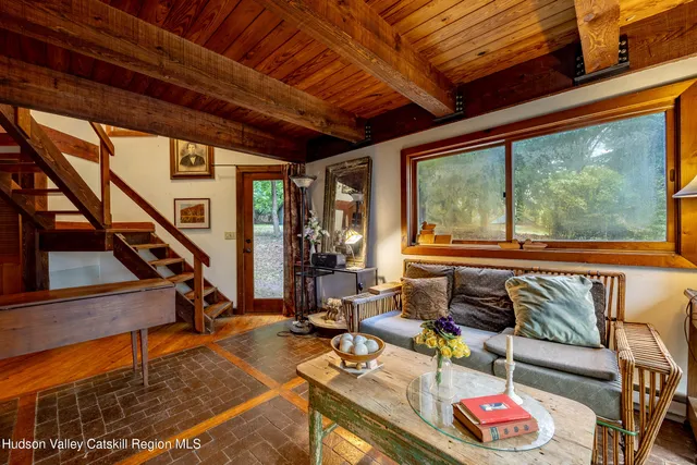 a room with furniture and wooden floor