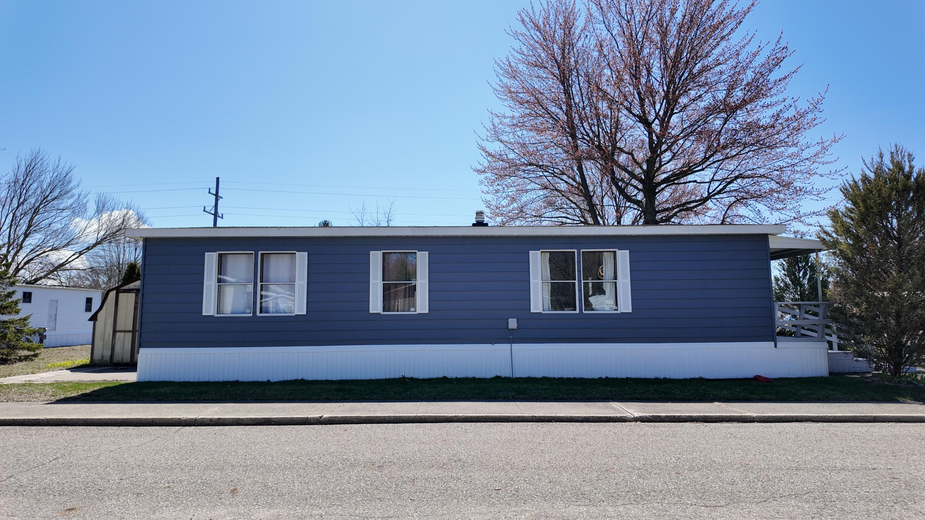 1700 Robbins Road, Unit 163 Grand Haven, MI 49417 - Photo 18 of 21 DJI_20260406135325_0970_D