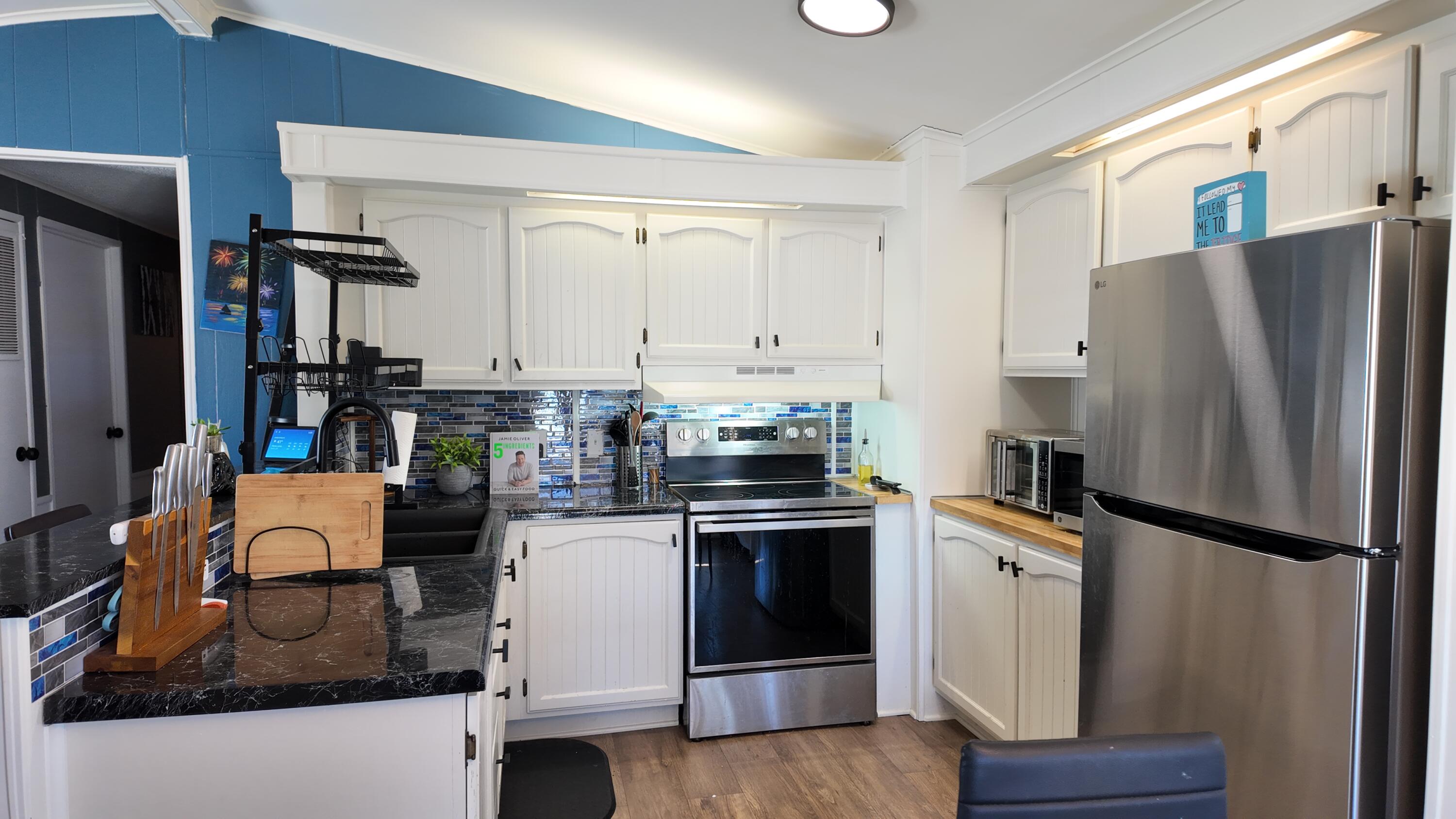 1700 Robbins Road, Unit 163 Grand Haven, MI 49417 - Photo 5 of 21 DJI_20260406133021_0950_D