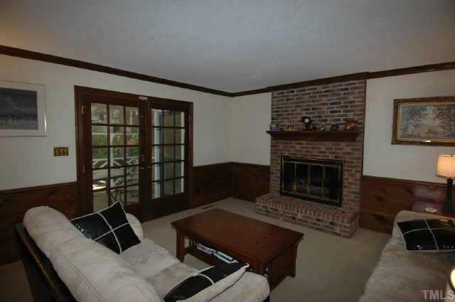 8109 Running Cedar Trail Raleigh, NC 27615 - Photo 5 of 11 a living room with furniture rug and window