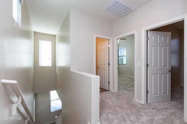 a view of a bathroom with a glass door shower