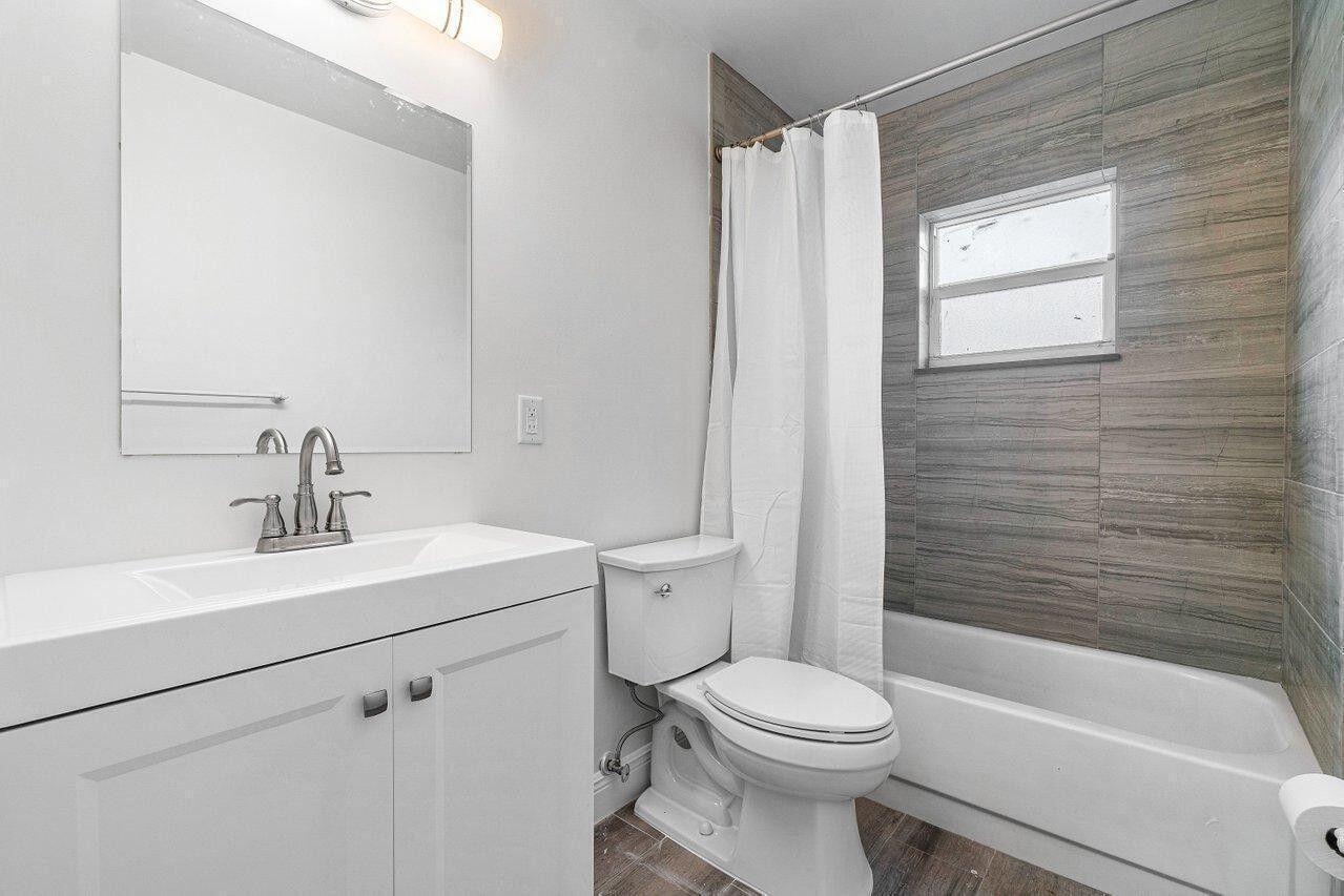 5567 2nd Road Lake Worth, FL 33467 - Photo 8 of 13 Guest Bathroom