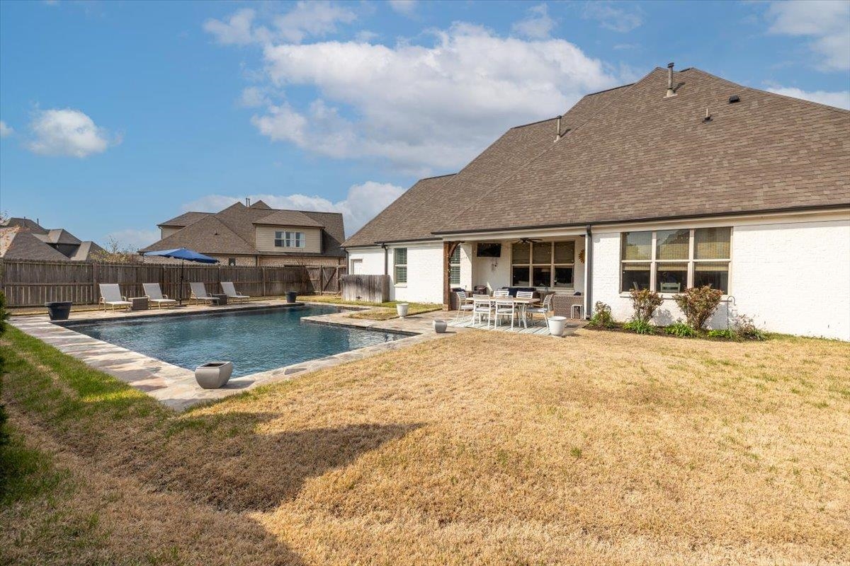 608 Cypress Run Cove Collierville, TN 38017 - Photo 31 of 40 View of pool with patio surround, a fenced backyard, and outdoor dining area