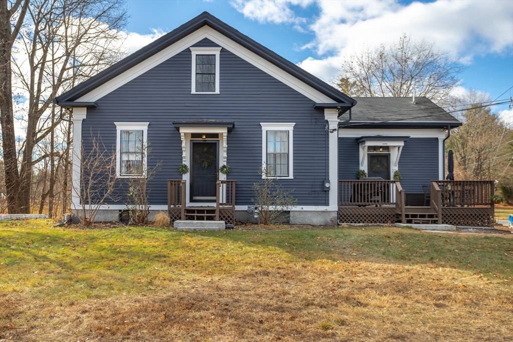 22 Sanderson Road Littleton, MA 01460 - Photo 1 of 30 a view of a house with a yard patio and fire pit