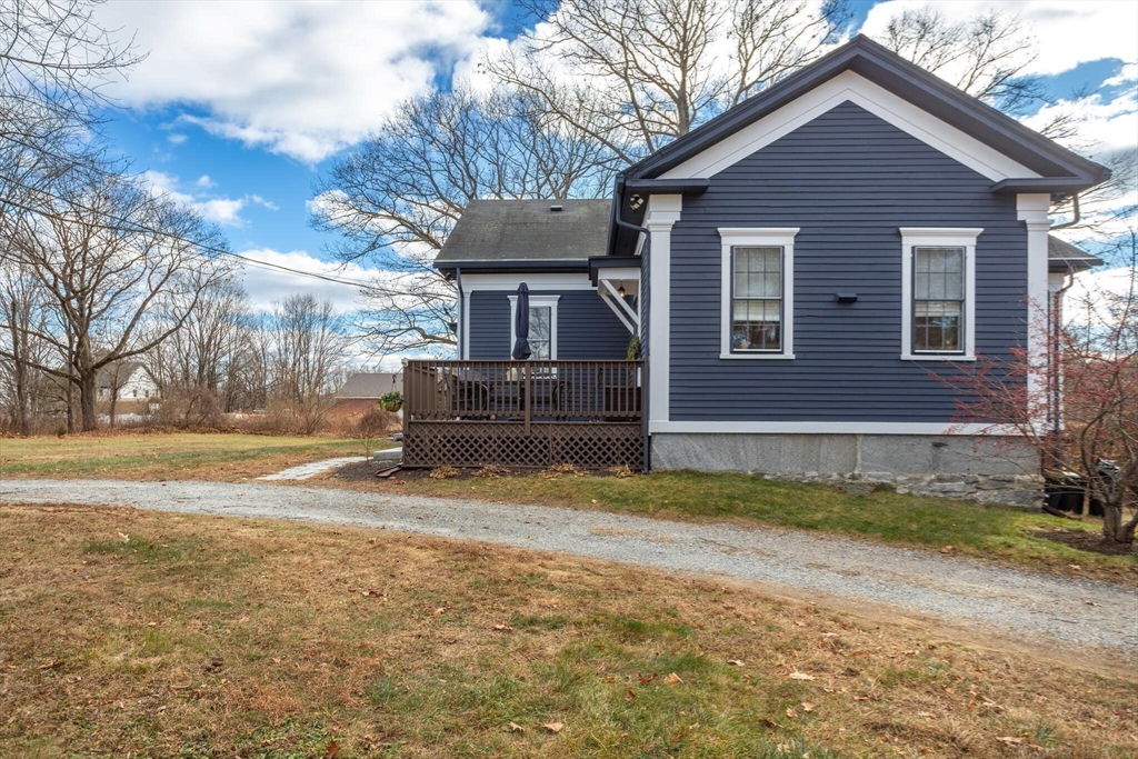 22 Sanderson Road Littleton, MA 01460 - Photo 30 of 30 a view of a house with a yard