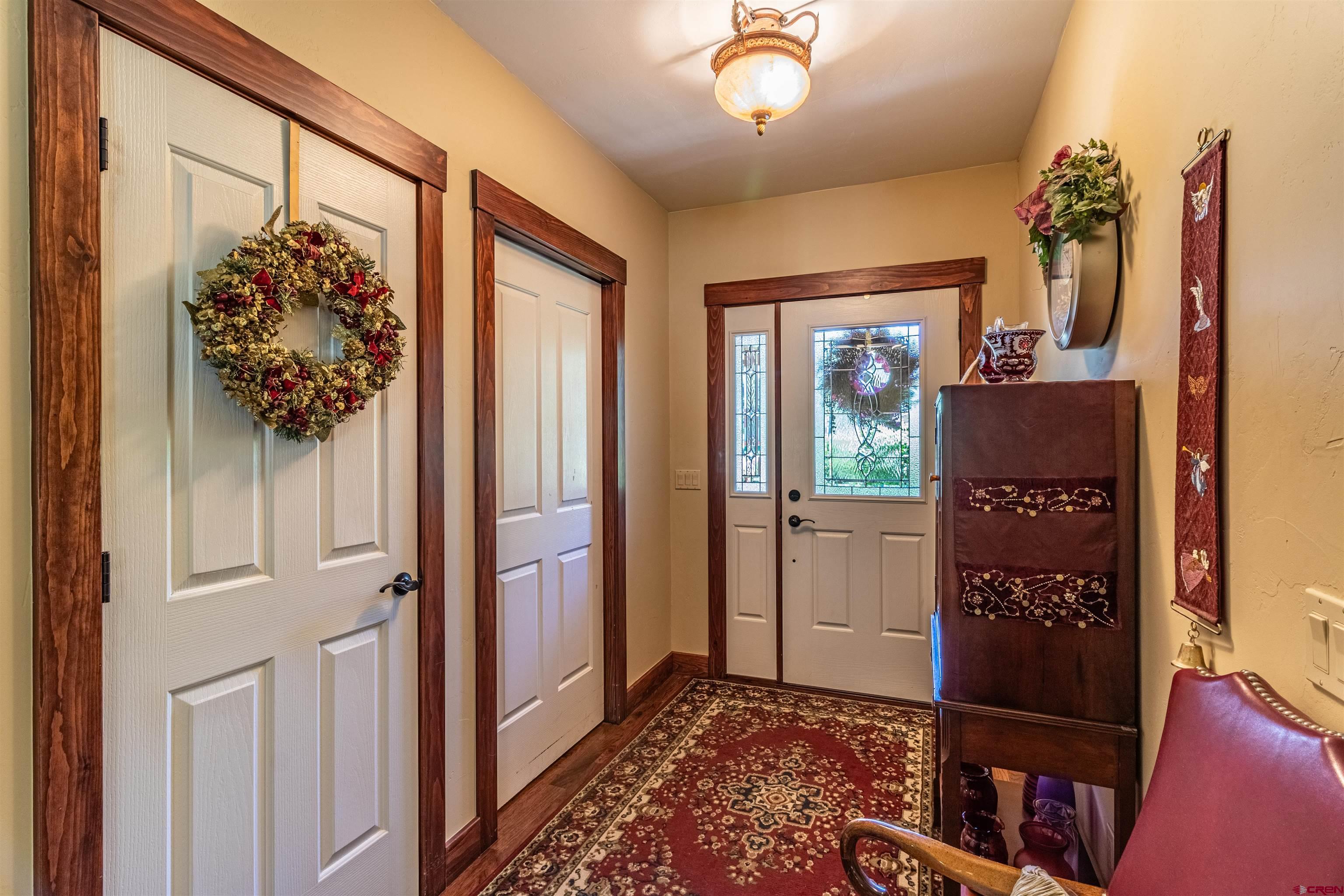 1167 North Dalton Ranch Road Durango, CO 81301 - Photo 5 of 45 a view of a entryway door