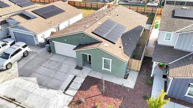 a aerial view of a house with a patio