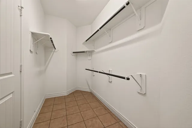 a view of a room with white walls