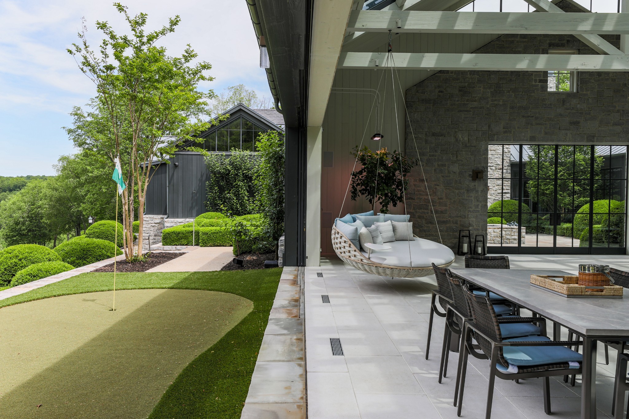 5845 Old 96 Franklin, TN 37064 - Photo 51 of 70 a view of a patio with couches table and chairs and potted plants
