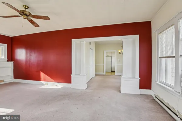 a view of empty room with windows