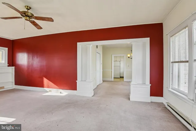 a view of empty room with windows